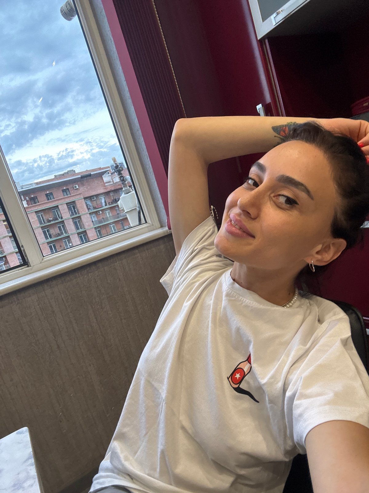 Woman Takes Extended Selfie Session in Tbilisi Kitchen and Balcony