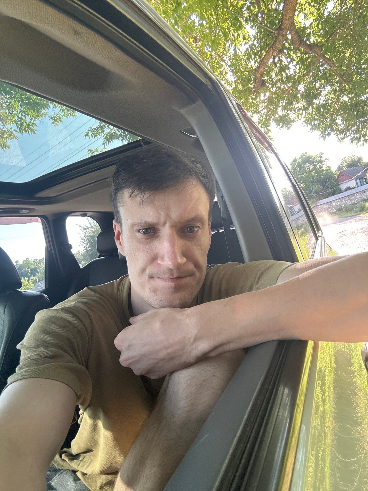 In-car selfie session parked on a rural road in Makiv, Ukraine