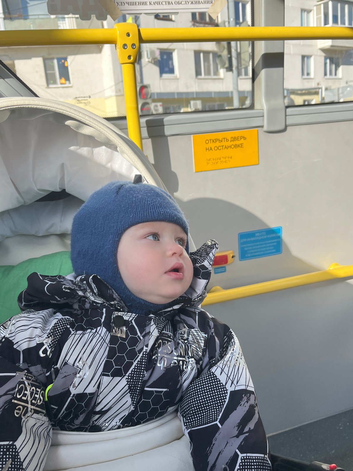 Morning scenes captured in Chaikovsky: transit riders, baby, roses
