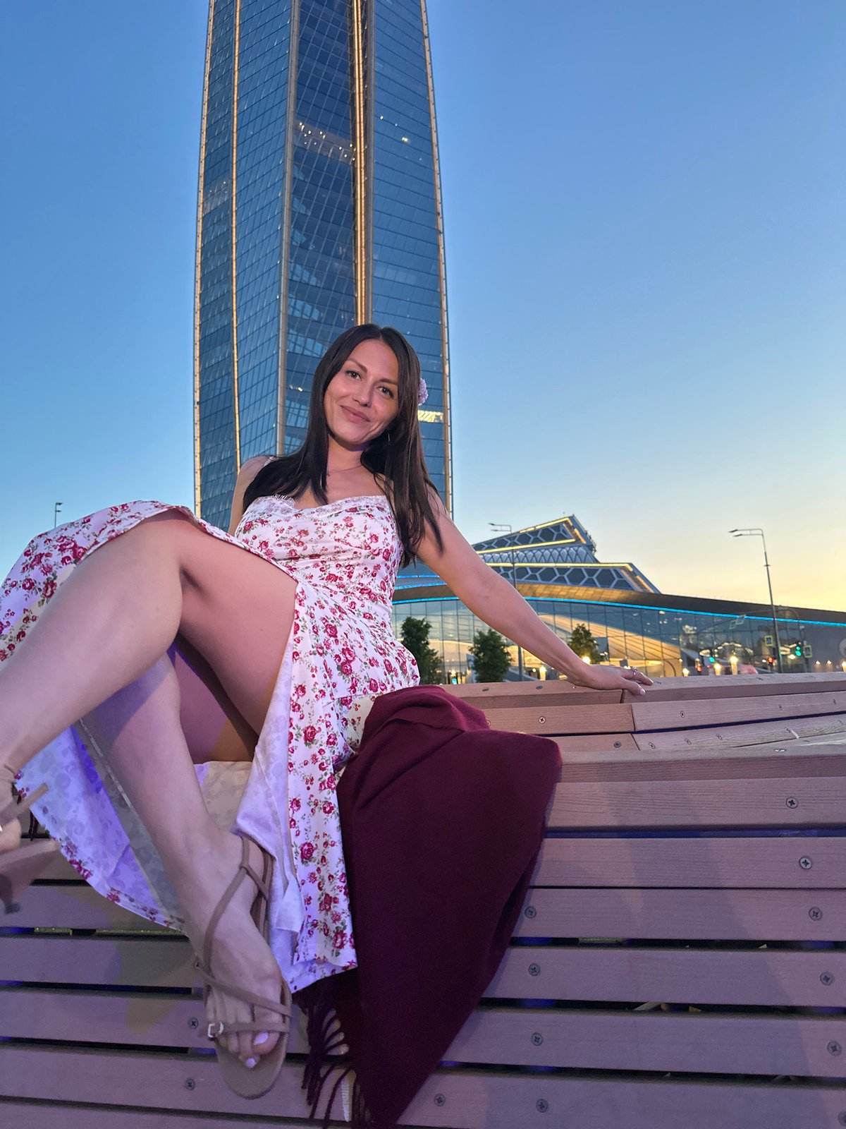 Woman in floral dress spotted across Saint Petersburg waterfront