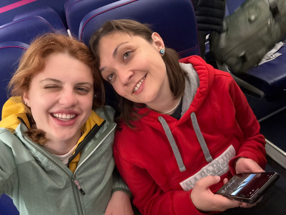 Two women photographed indoors in Fiumicino, Italy