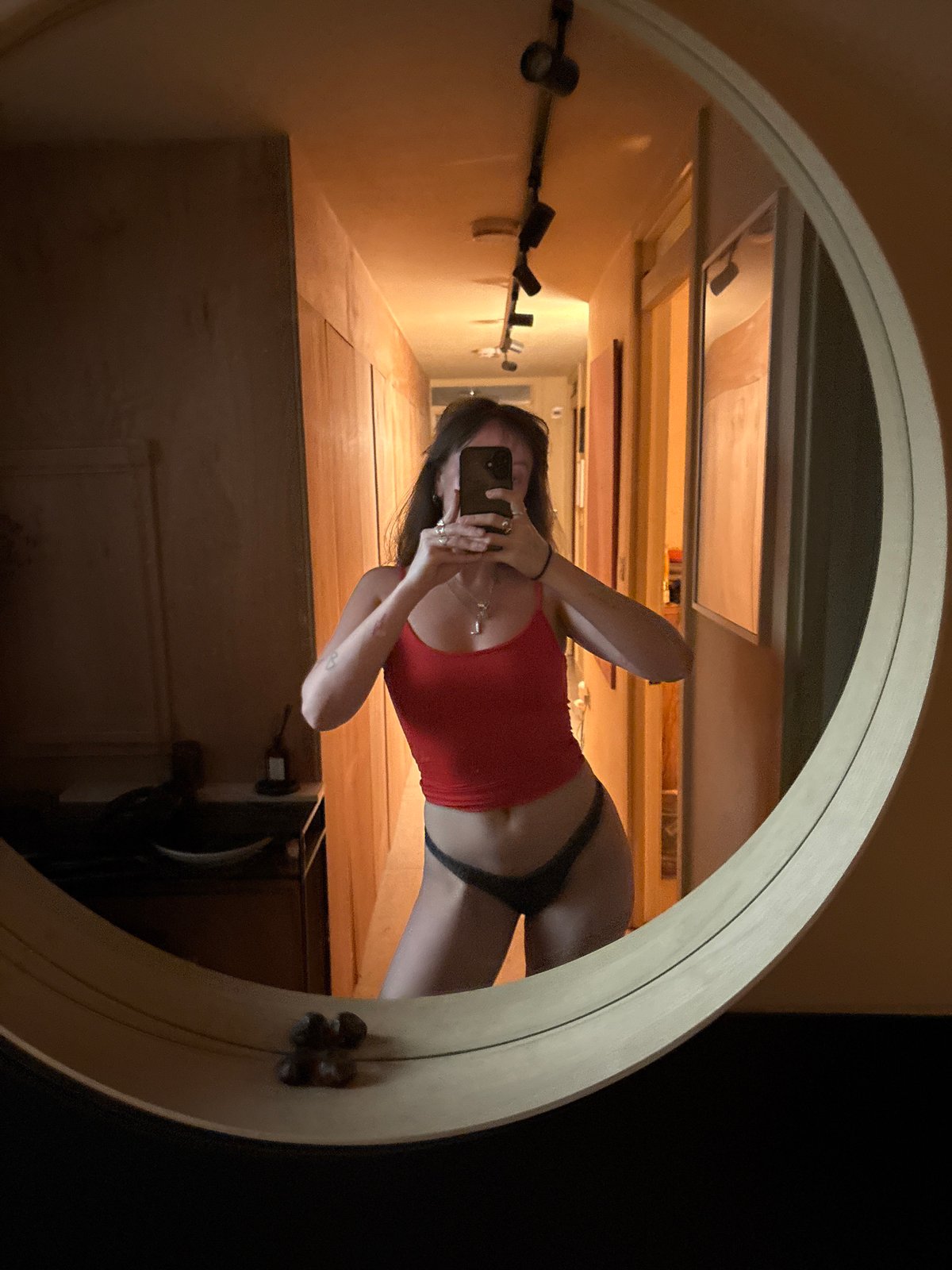 Woman takes mirror selfie in London