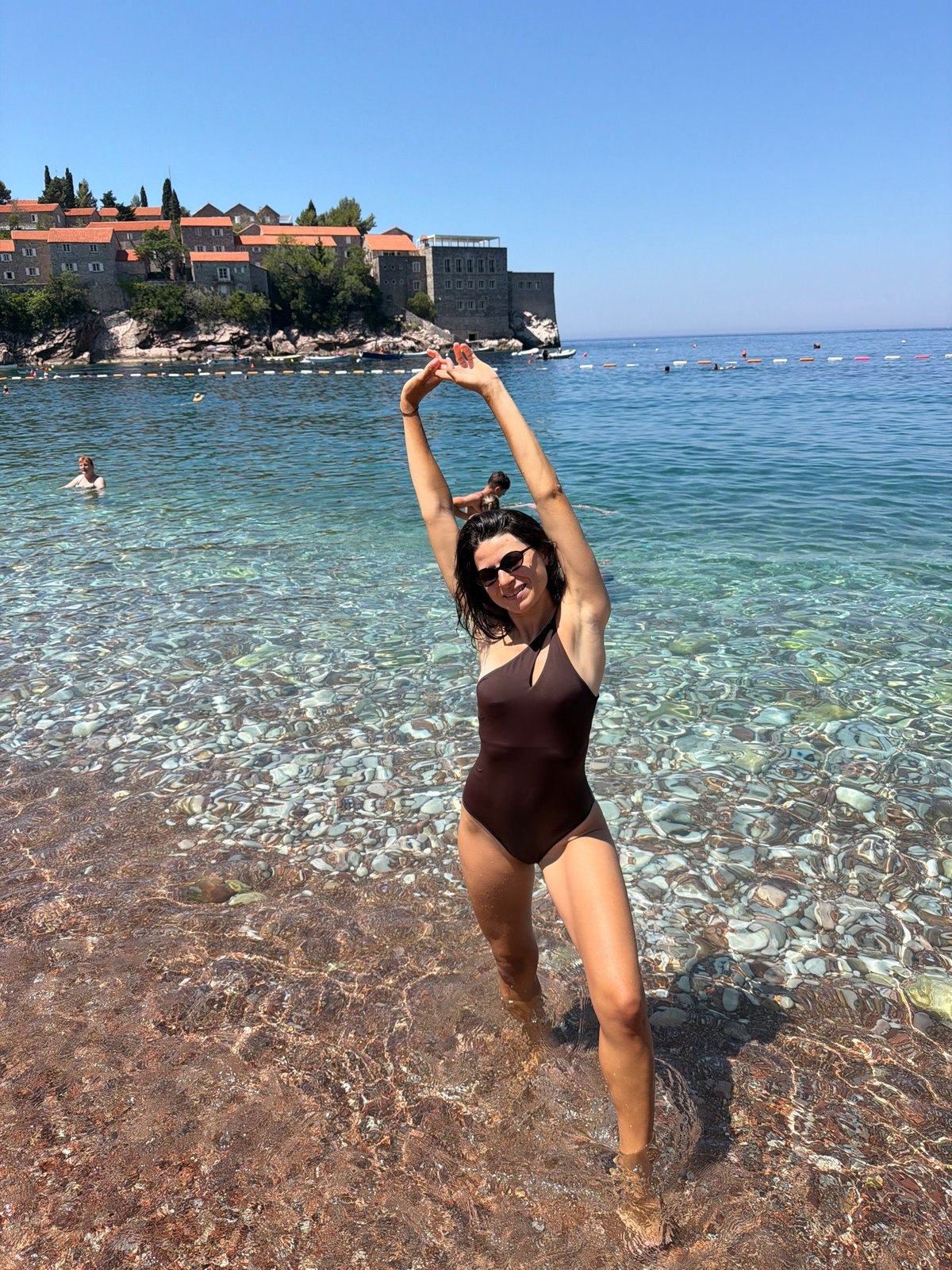 Clear waters and pebble shore at Rađenovići beach, Montenegro