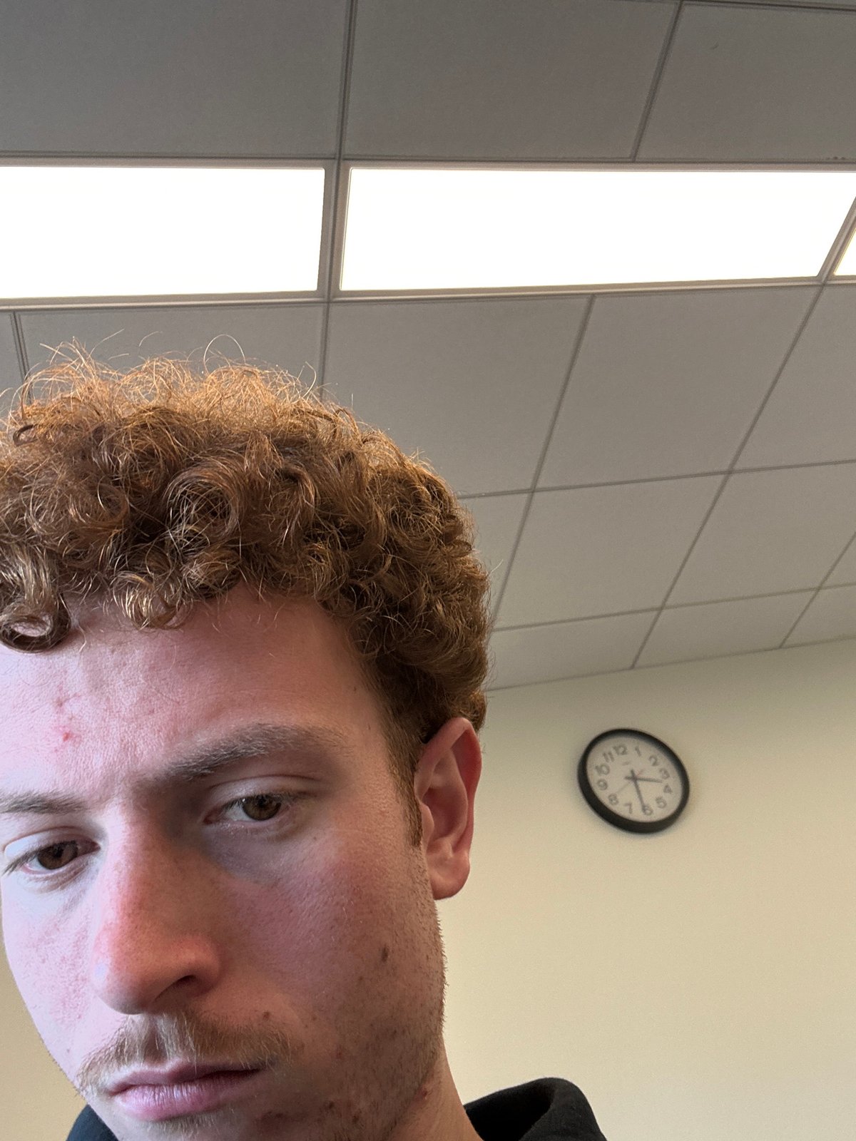 Student checks investment account during class in NYC