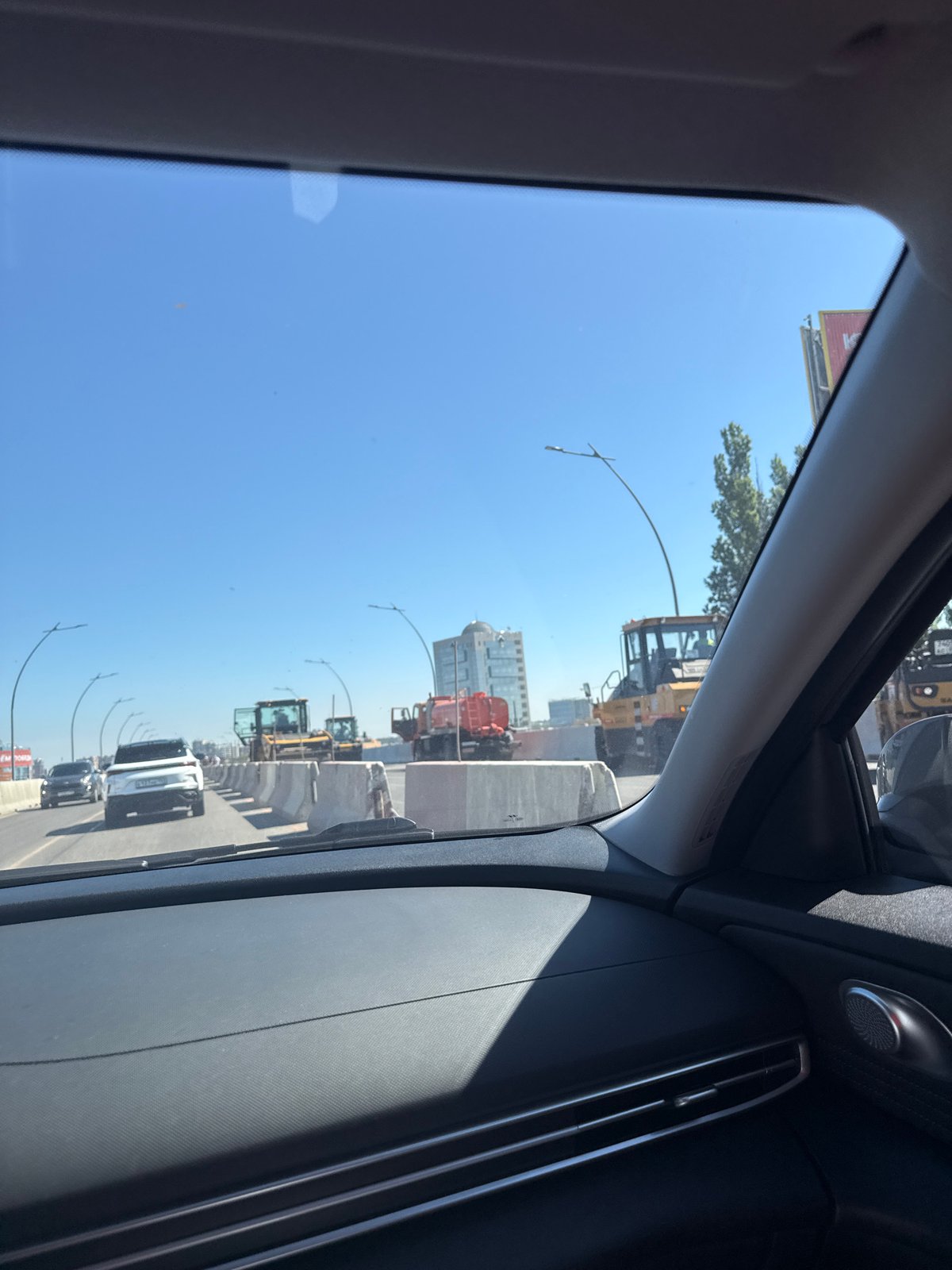 Morning drive through city streets captured from vehicle interior