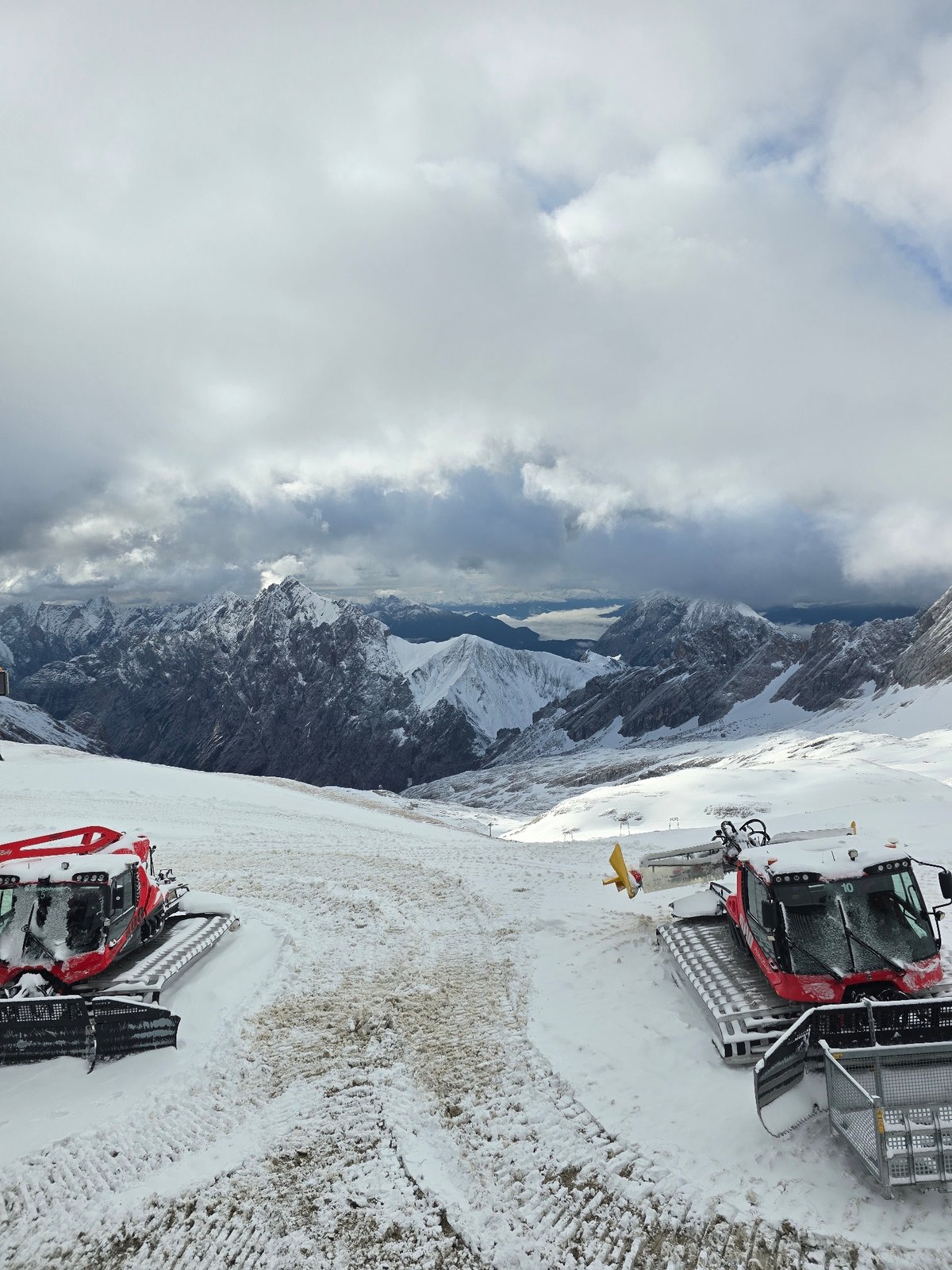 Summer snow blankets Garmisch-Partenkirchen ski resort infrastructure