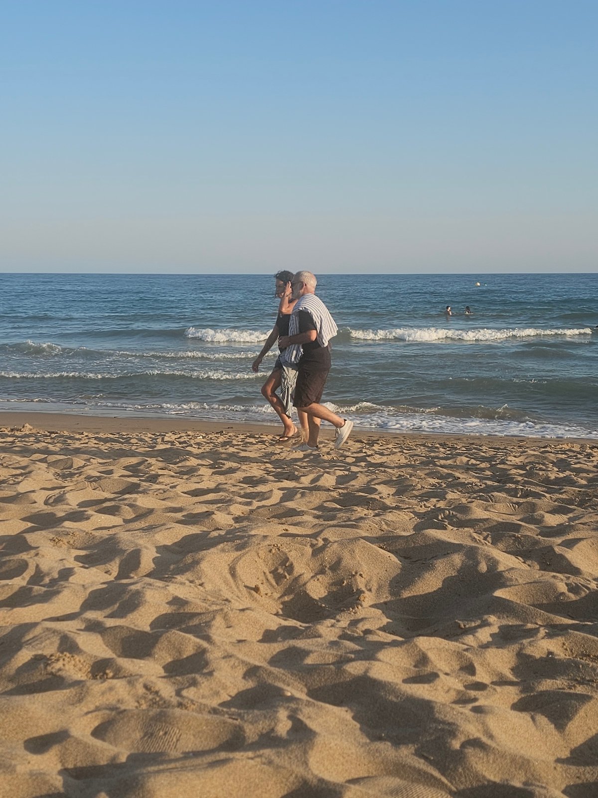 Busy summer afternoon at Castelldefels beach near Barcelona