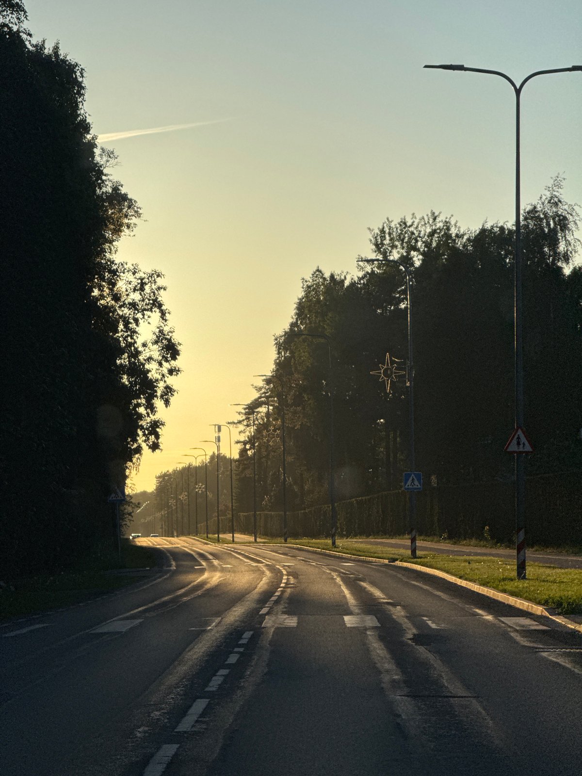 Evening drive through Tallinn captured during golden hour sunset