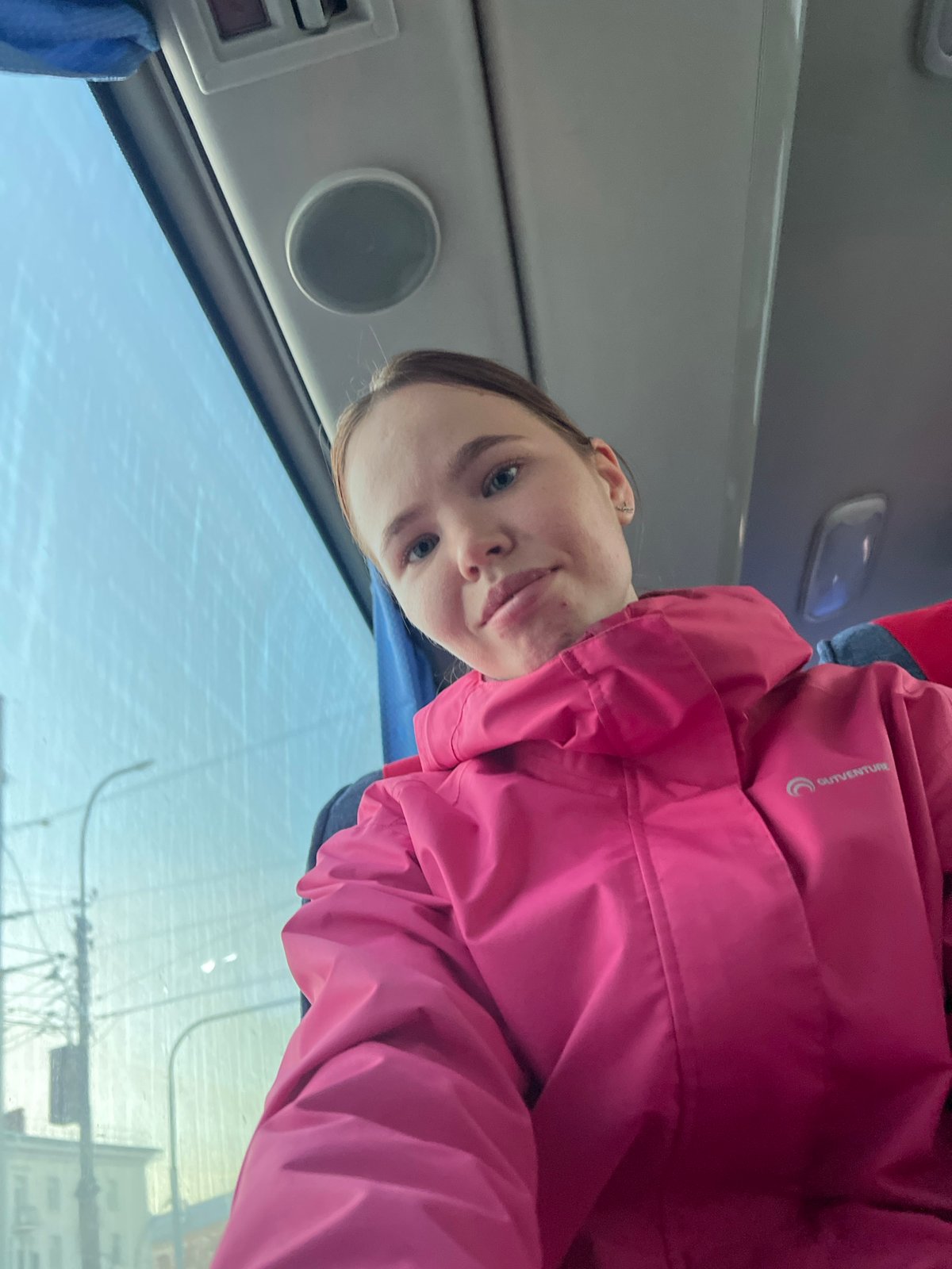 Bus rider and classical rotunda documented in Usolye, Russia