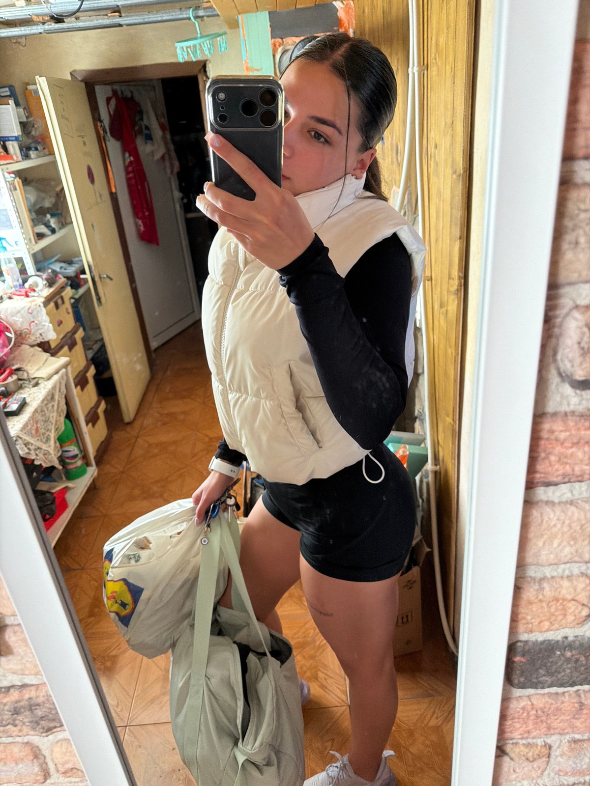 Woman takes mirror selfie in Balinovtsi, Bulgaria early morning