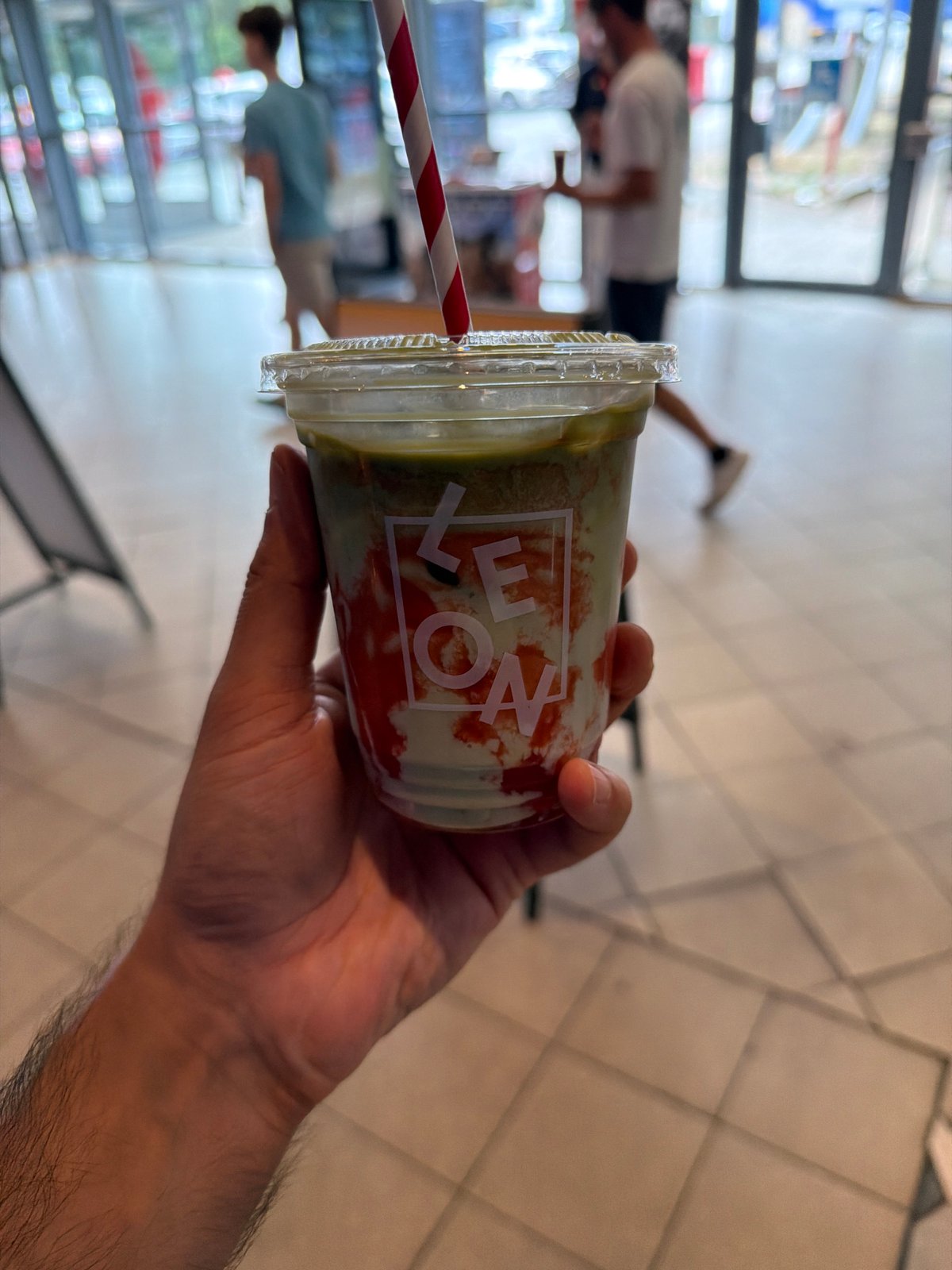 Layered matcha and strawberry drink, Northampton