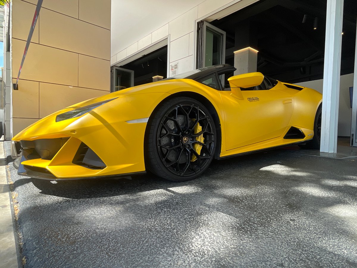 Luxury sports cars on display draw crowds in Barcelona