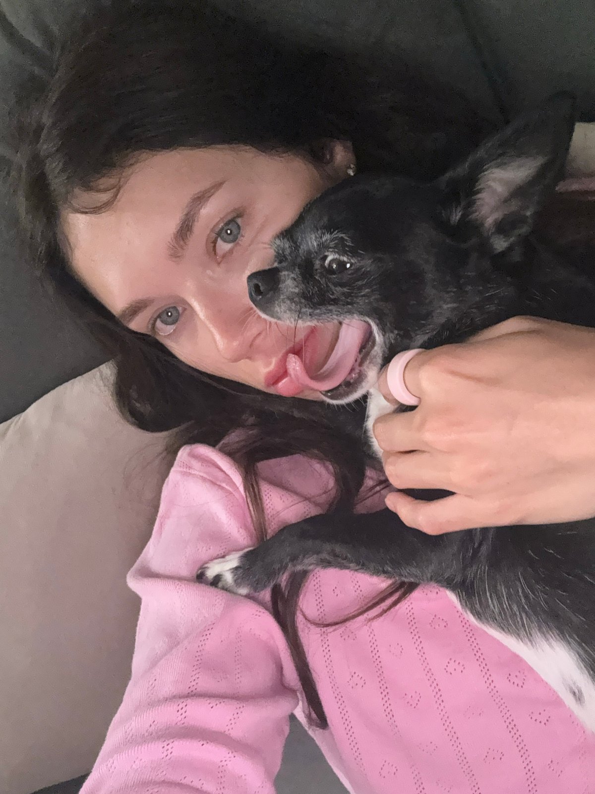 Couple and small dog documented in casual indoor moments