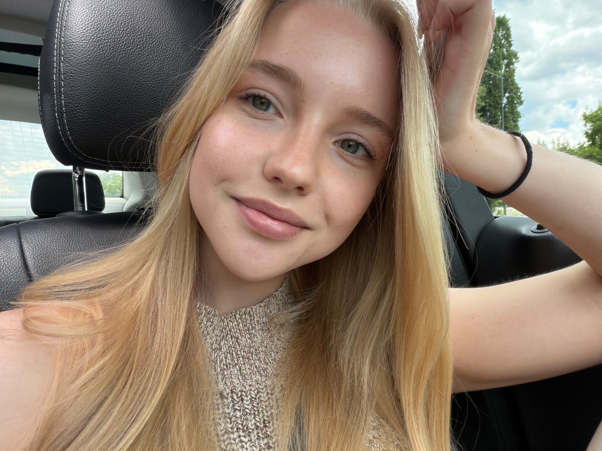Woman takes selfie while driving vehicle Sunday morning