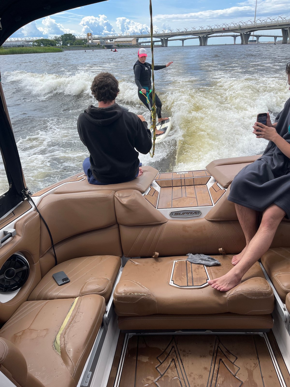 Wakeboarding behind a speedboat on St. Petersburg waters