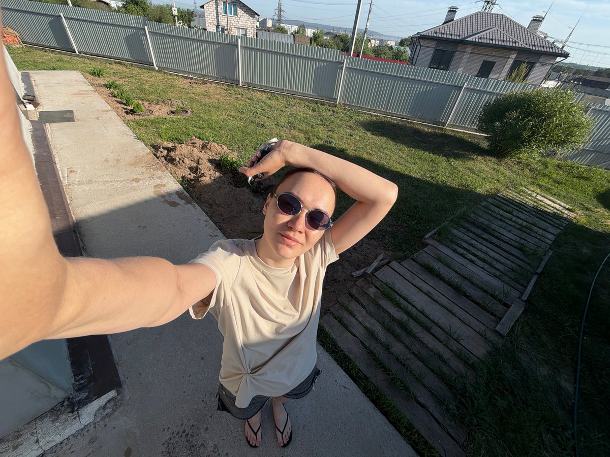 Woman takes outdoor selfies in Chaikovsky, Russia