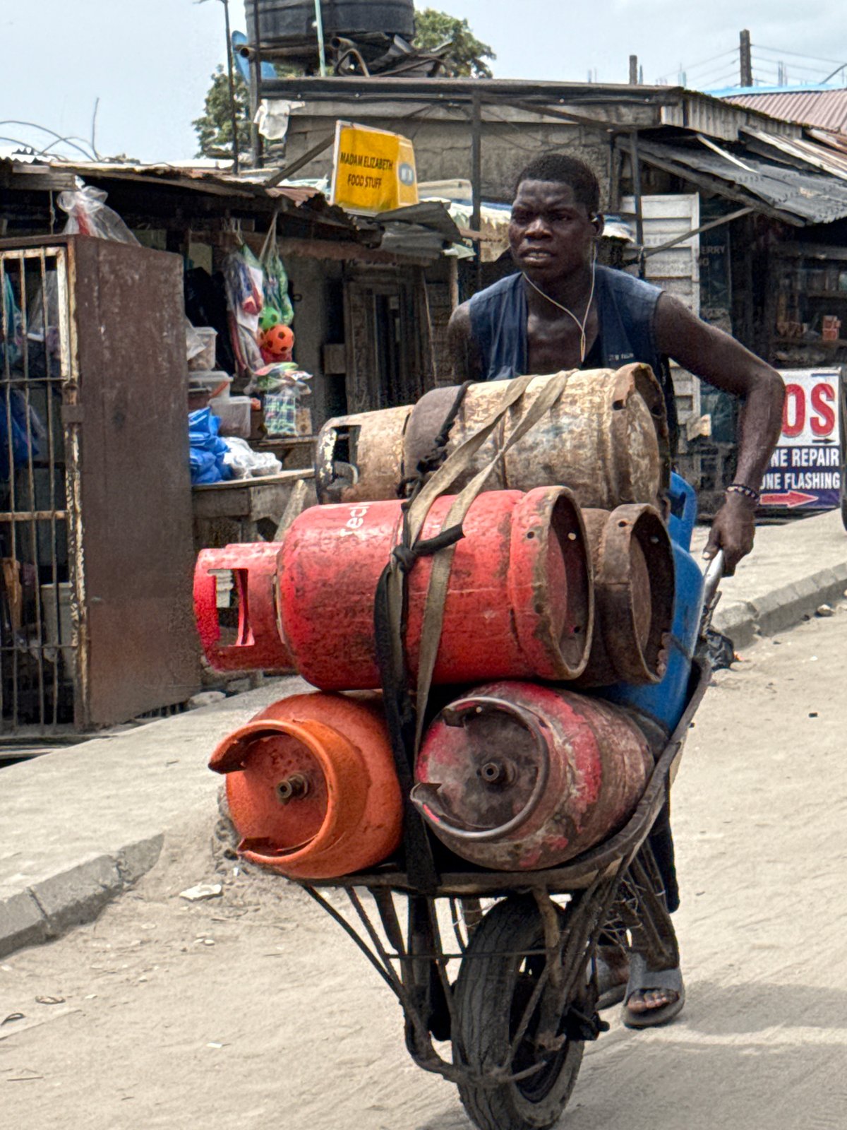 Lagos area residents spotted with gas transport bicycle, motorcycle