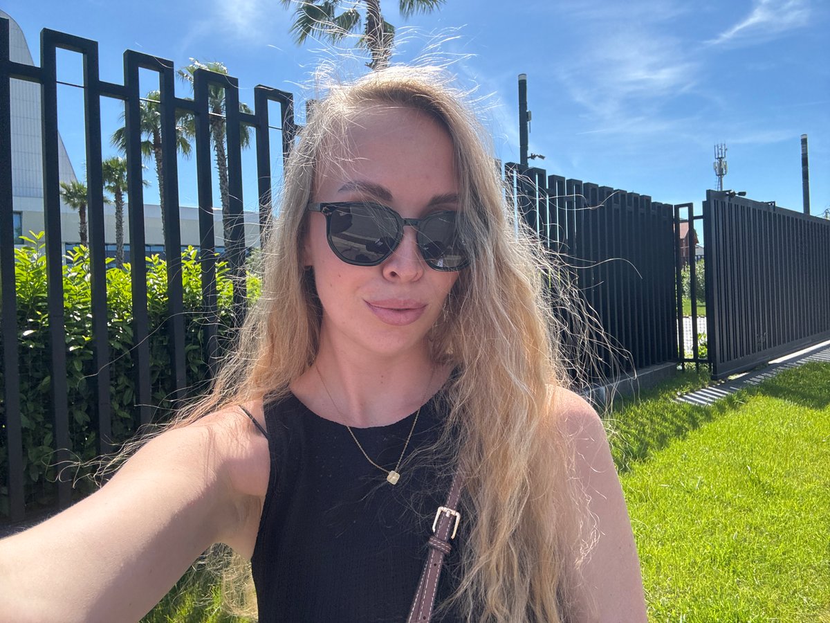 Woman documents sunny day in Sirius, Russia with selfies