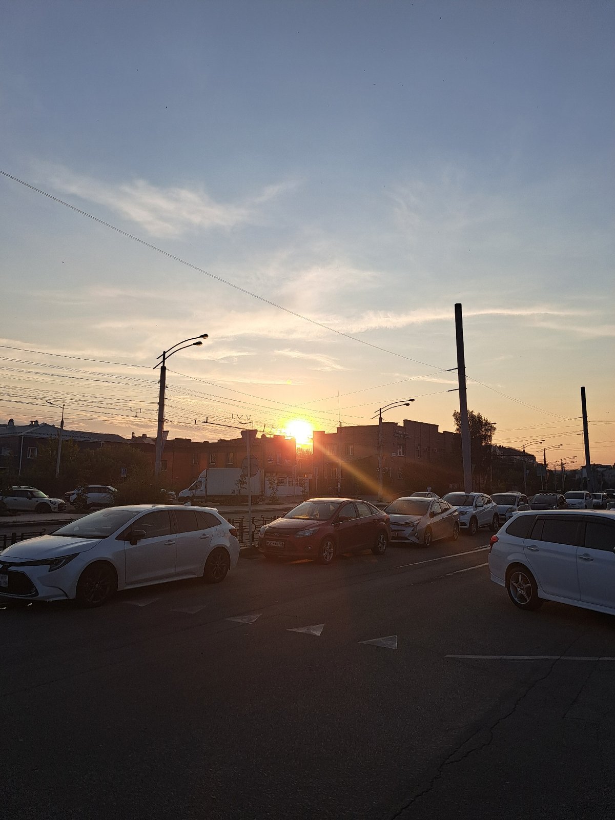 Car selfies and a warm summer sunset in Irkutsk