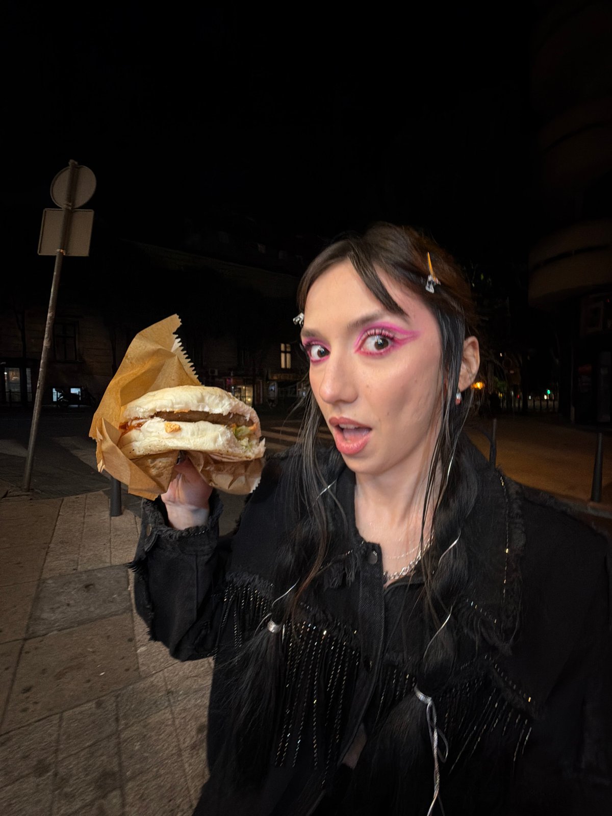 Late-night street food dining captured in Belgrade