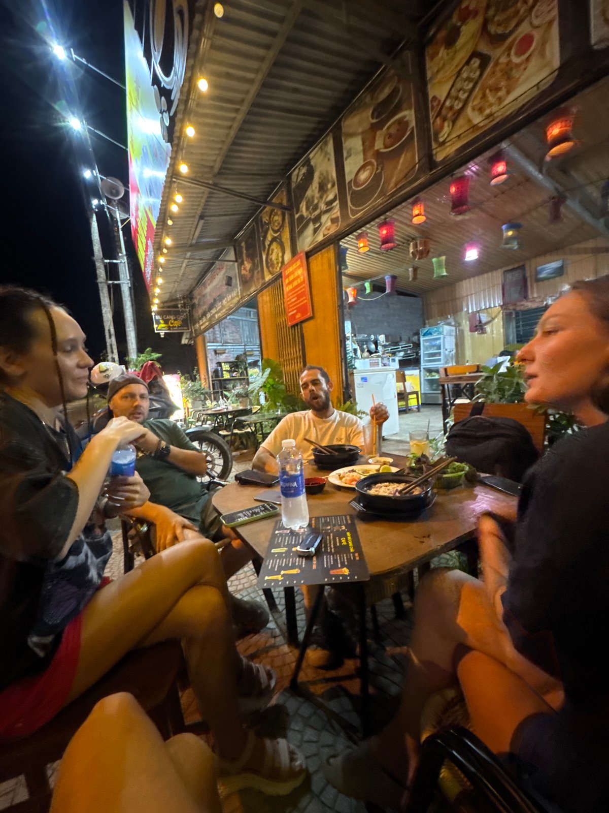 Evening dining gathering captured in Mù Cang Chải, Vietnam