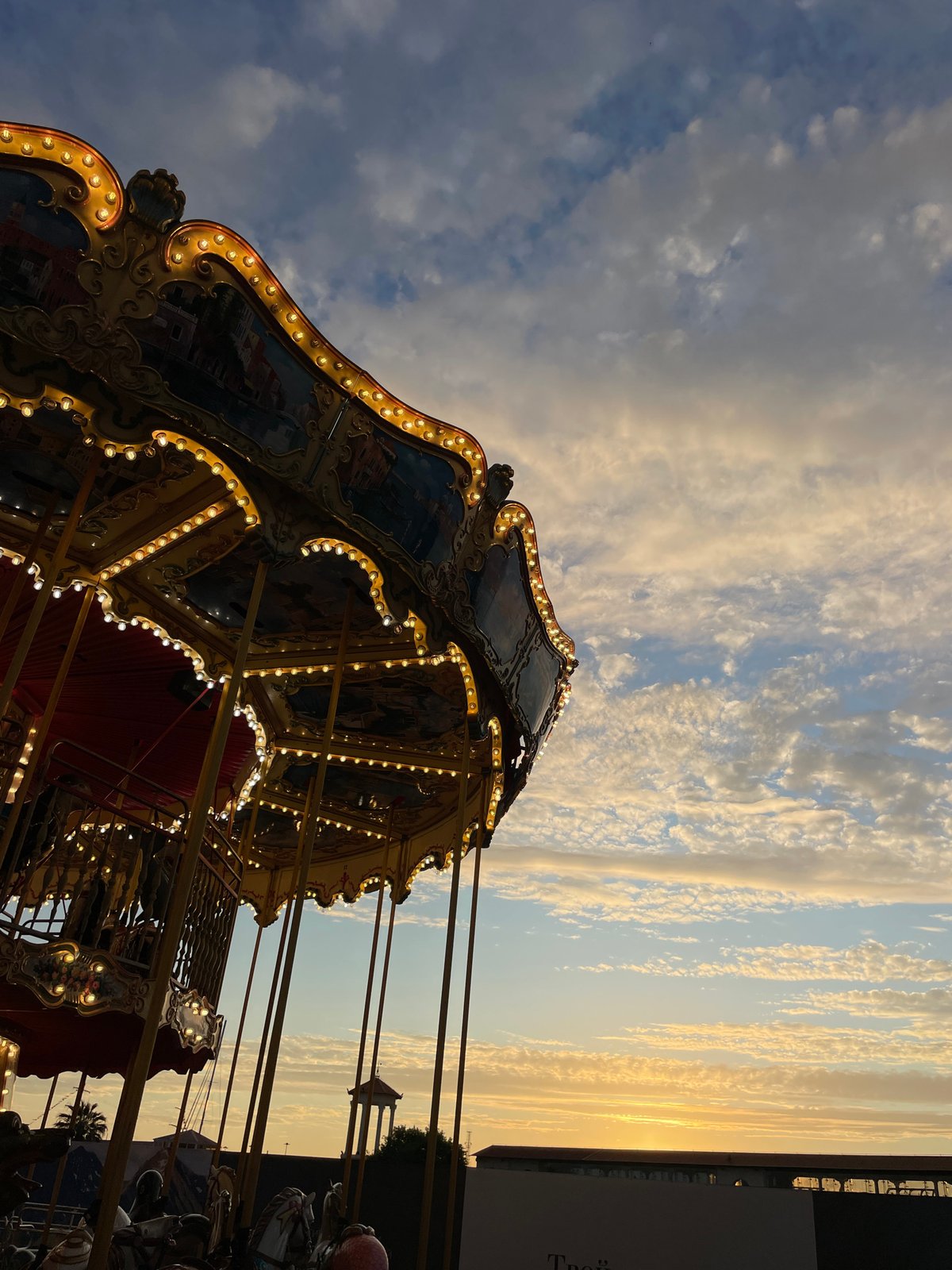 Sochi promenade at golden hour: breakdancers, live music, carousel lights