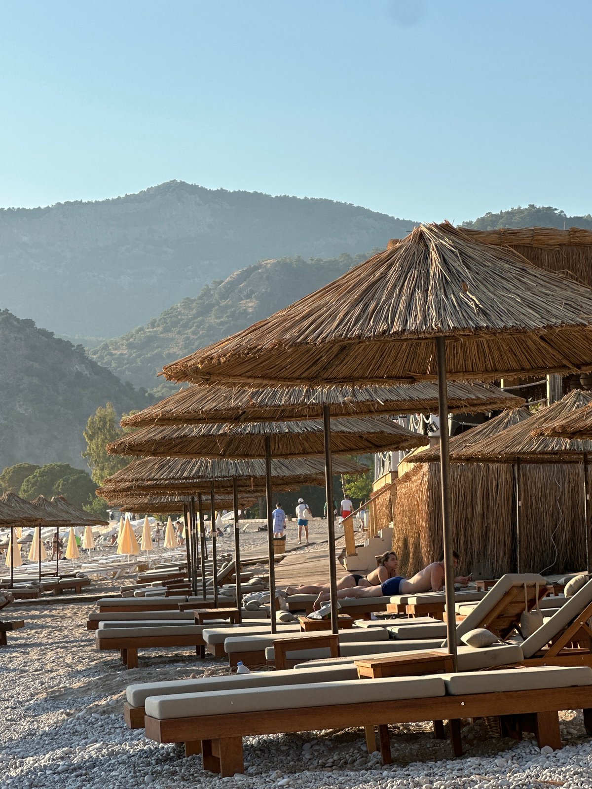 A Fethiye beach afternoon drifts into golden-hour sunset