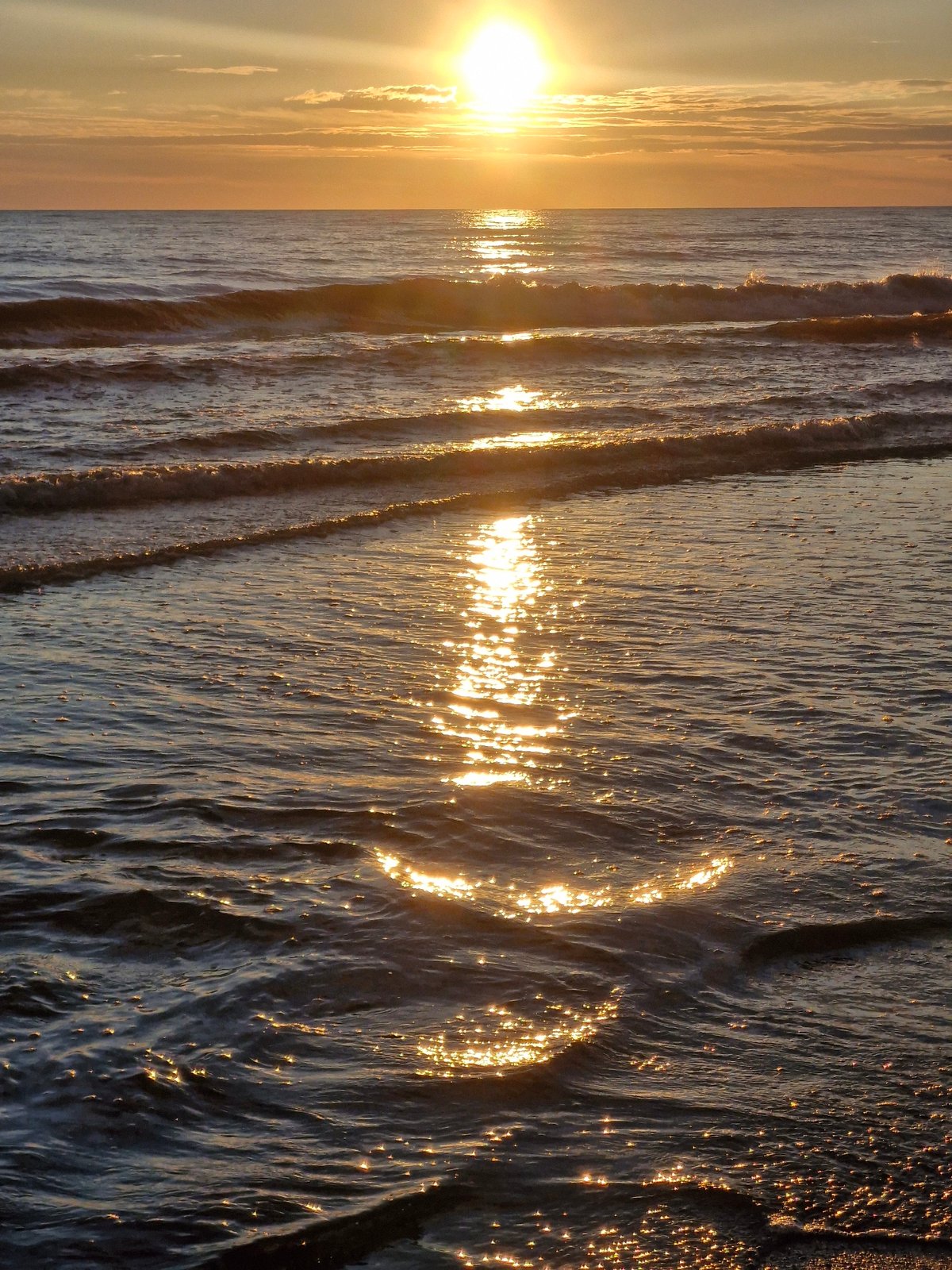 Baltic sunset on the Klaipėda shore, golden hour