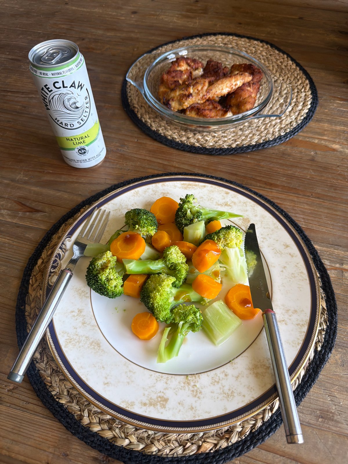 Dinner with steamed vegetables and White Claw seltzer