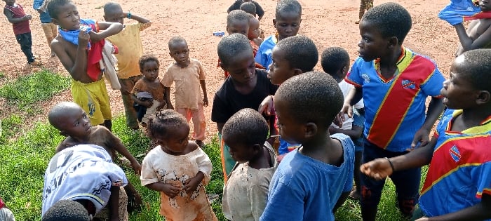 Children gather for outdoor play in DRC villages
