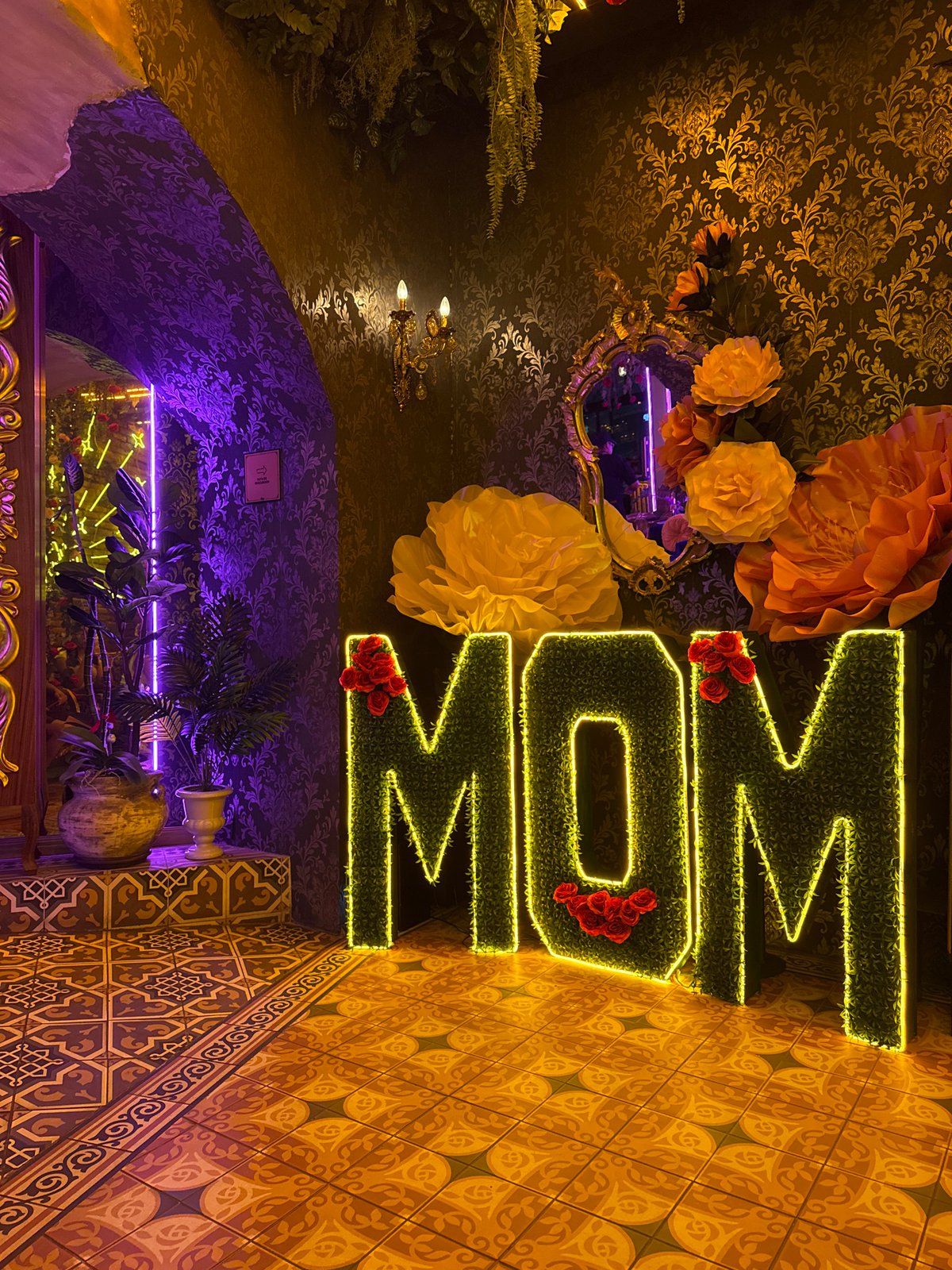 Neon-lit decorative installations documented in Puebla interior space