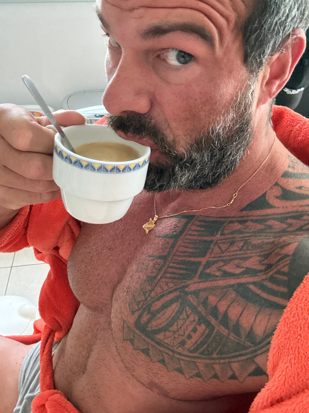 Man drinks morning coffee in Marche-en-Famenne, Belgium