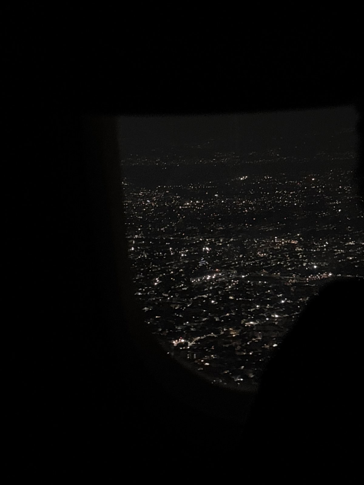 Nighttime urban scenes: rainy window view and underground tunnel documented