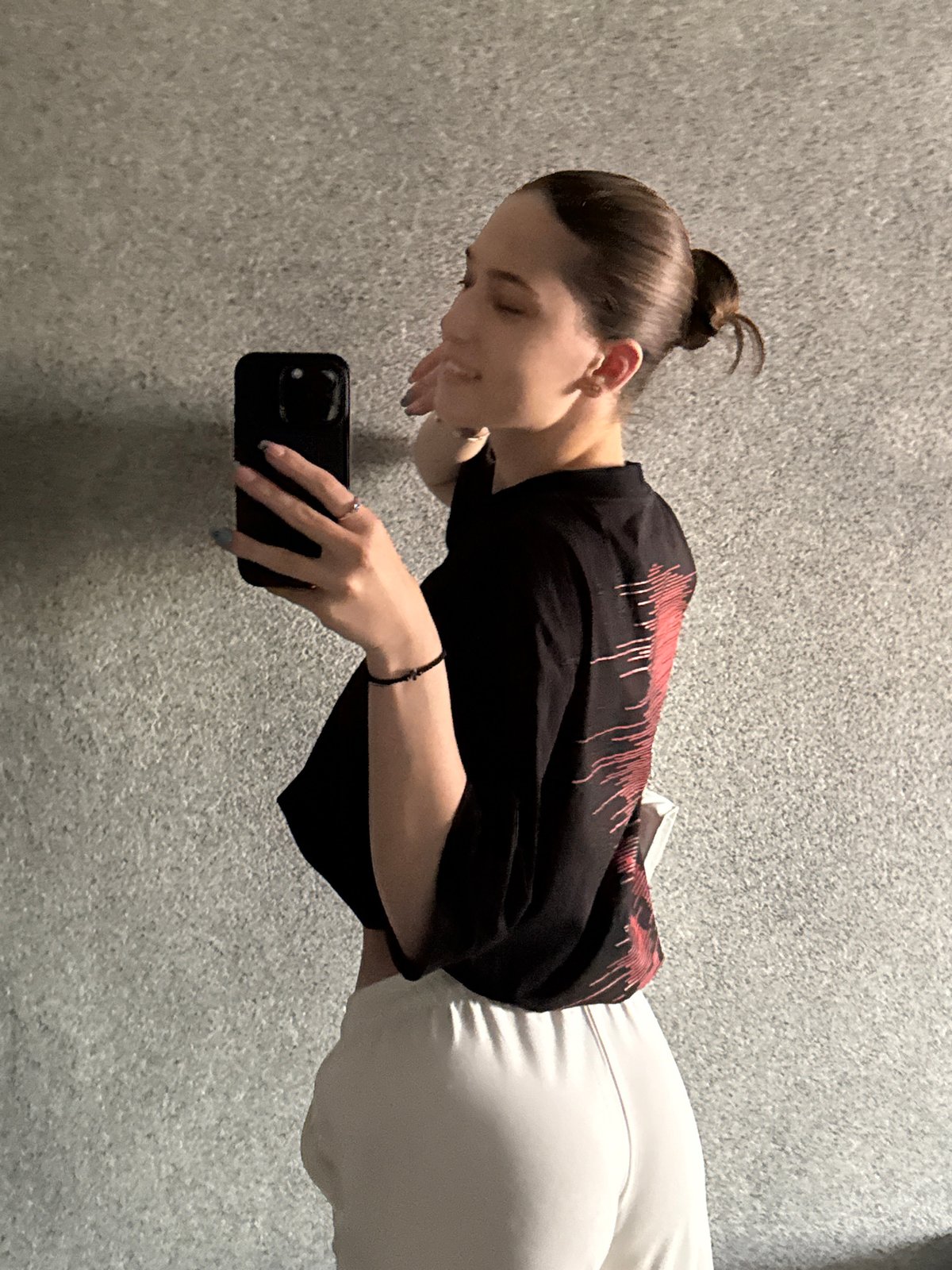 Woman takes selfies with dog in Sofia apartment