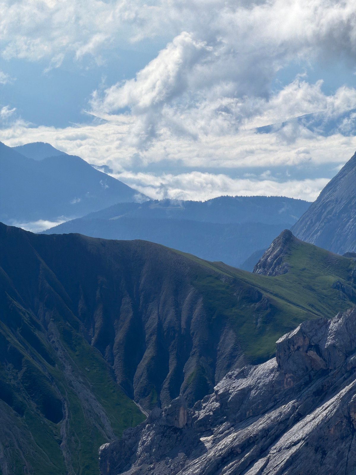 Alpine infrastructure and rocky peaks in summer, Wildermieming