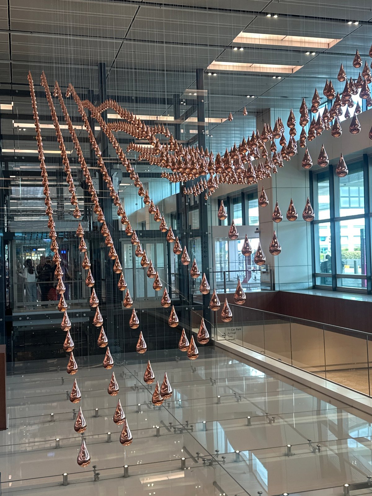 Changi Airport: ceiling art, robot bartender, and terminal life