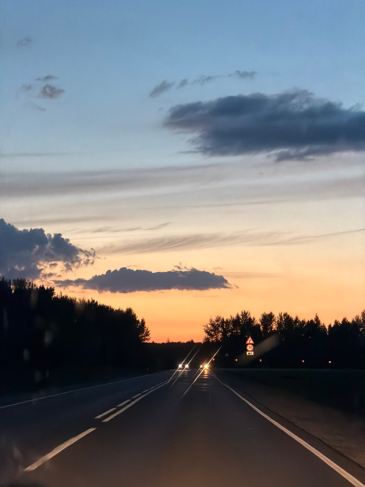Sunset to dusk along a rural road near Laishevo, Russia
