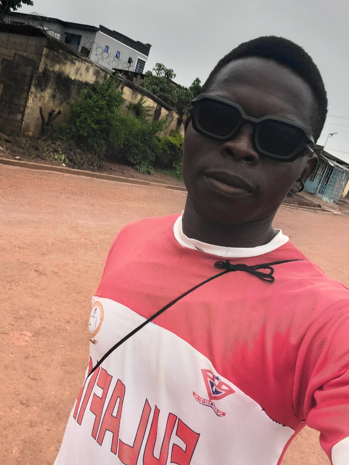 Street life and residential scenes across two Nigerian neighborhoods