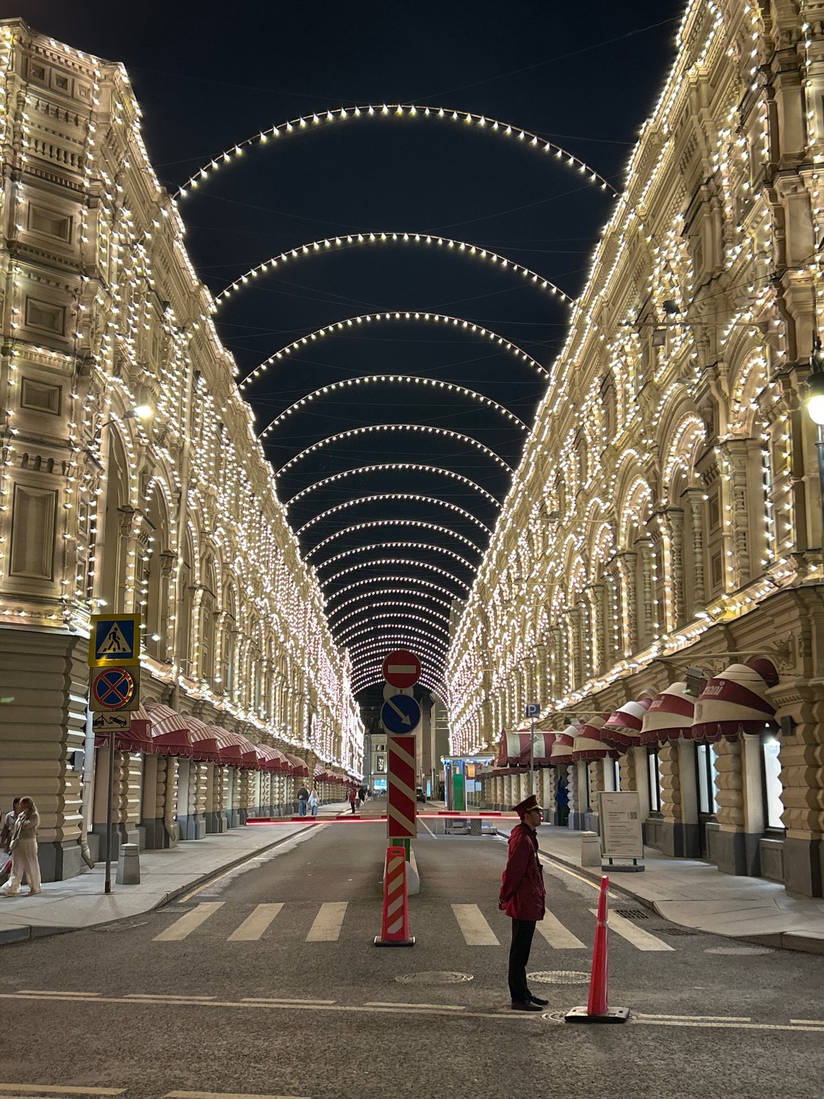 GUM department store glows under festive light canopies on Red Square