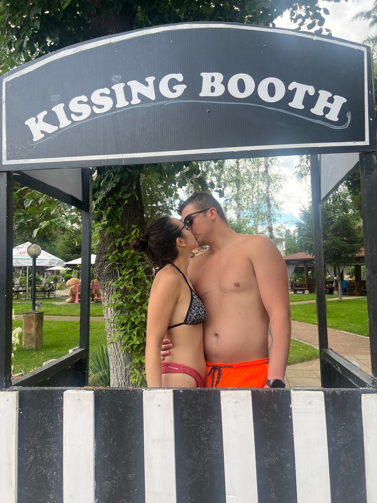 Kissing booth moment at an outdoor spot in Kubratovo