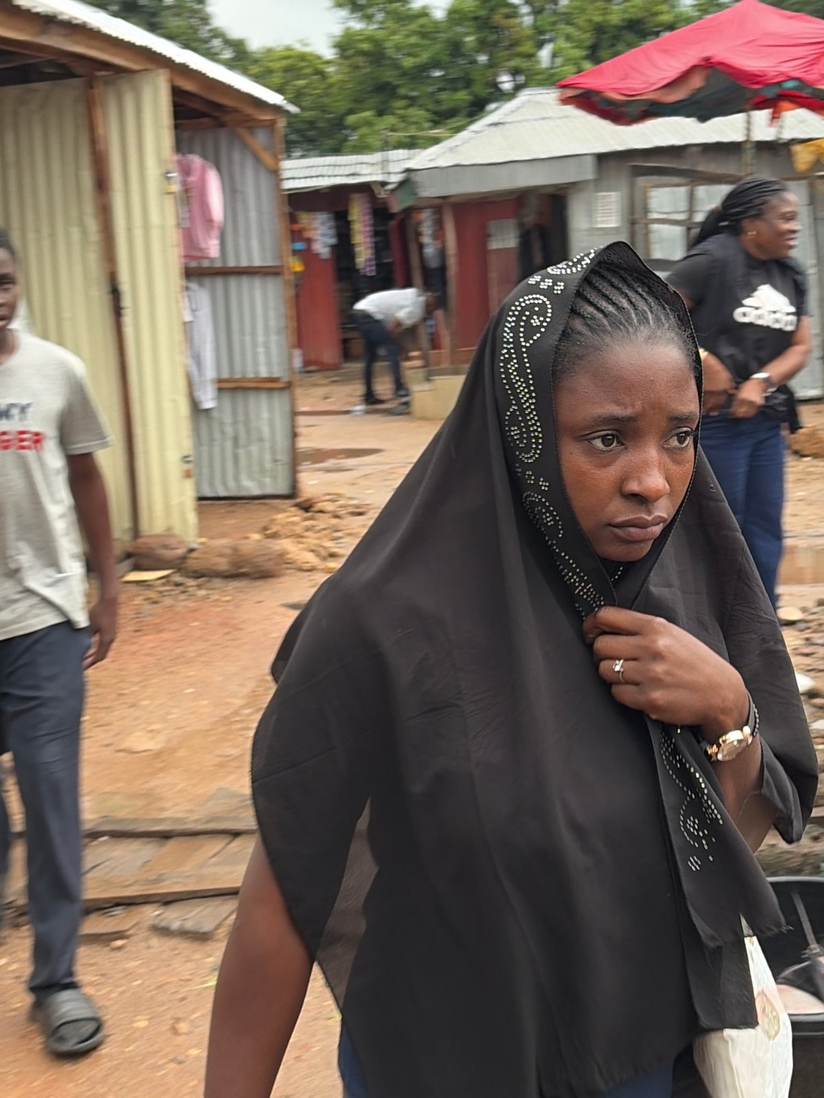 Rainy afternoon across Jos markets, streets, and shops