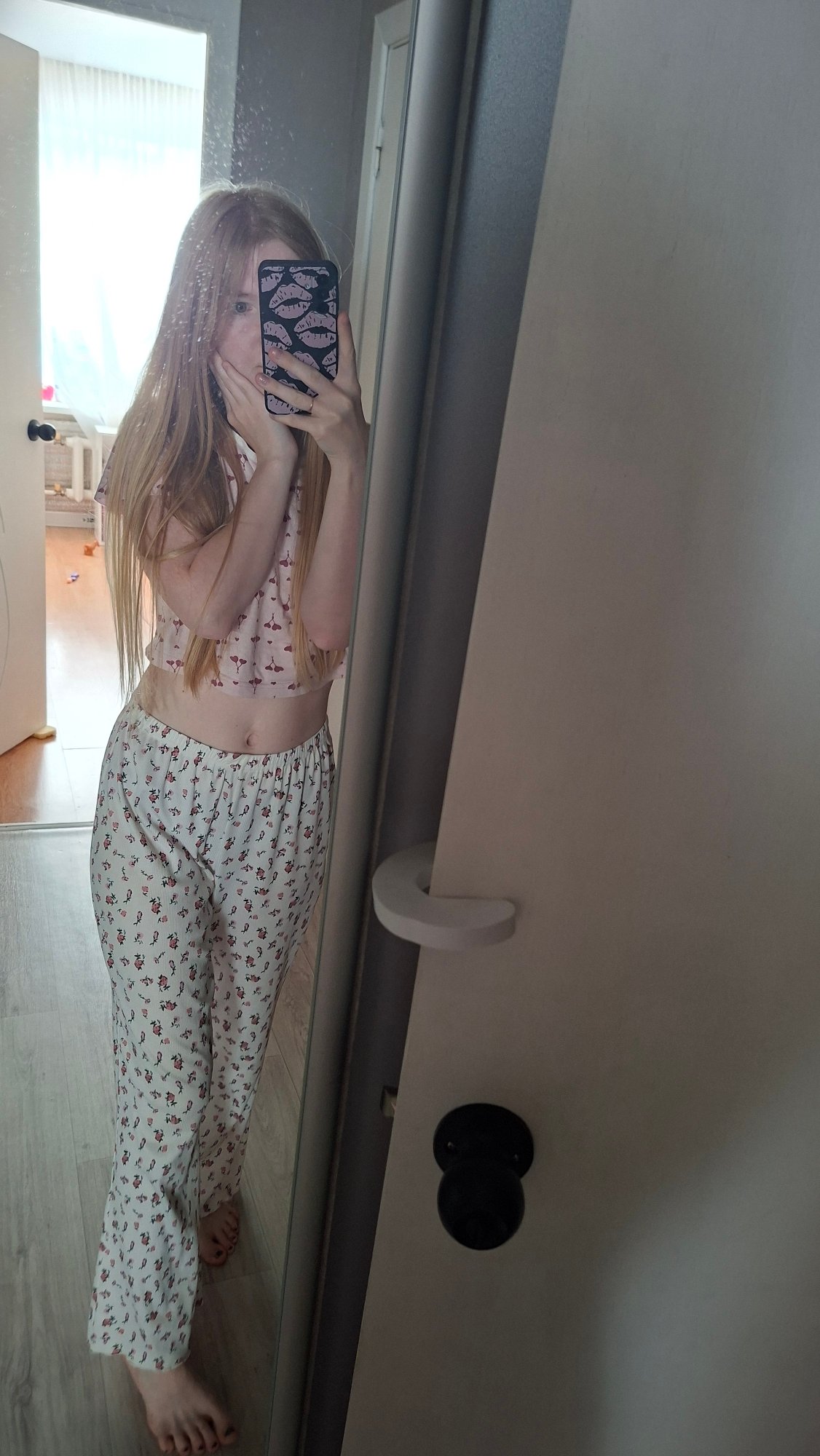 Cozy night in with a gray cat, selfies, and pink pajamas