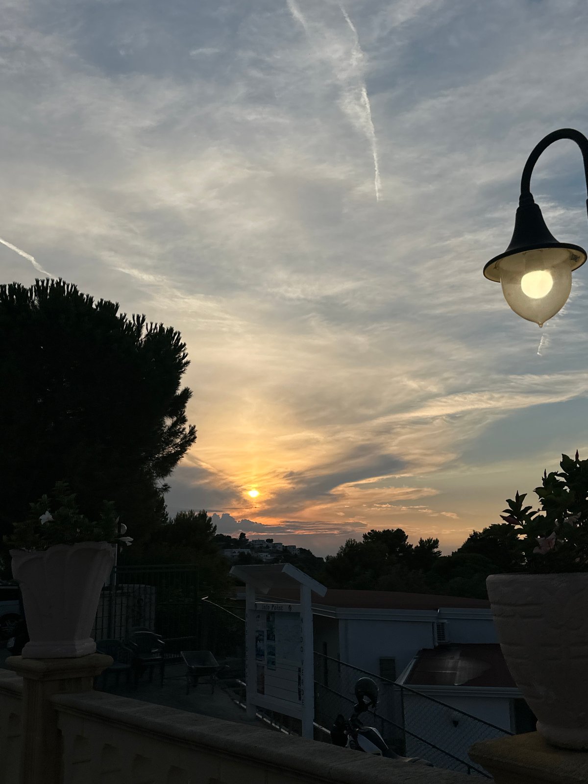 Sunset hour on a busy Peschici beach, Adriatic coast