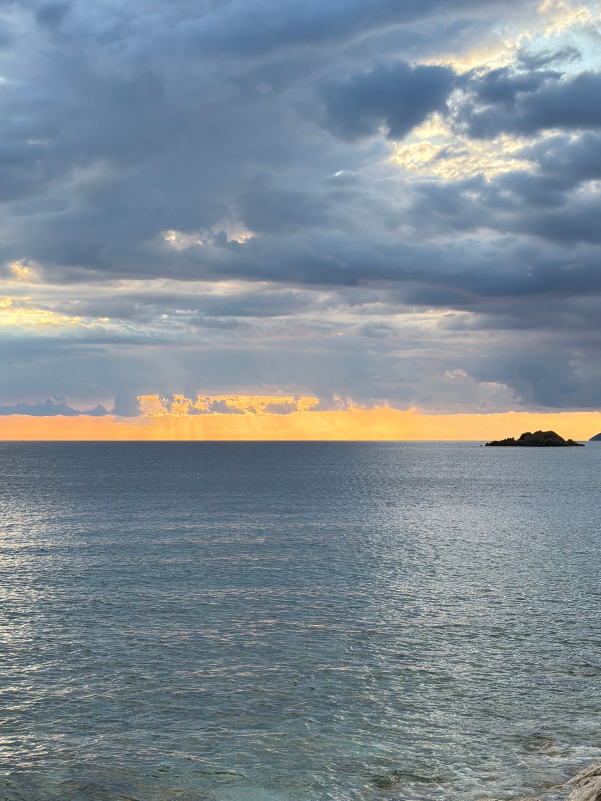 Sunset seascape with dog witnessed in Perazića Do, Montenegro
