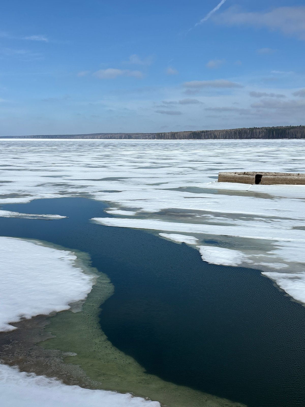 Spring ice conditions observed on waterway in Chaikovsky, Russia
