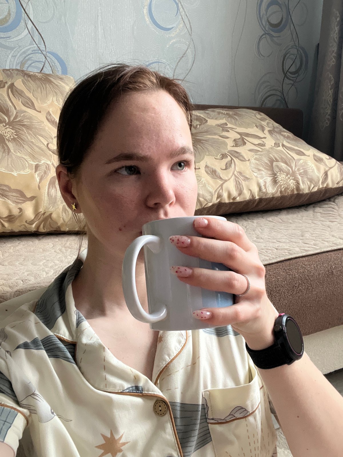 Woman's quiet morning routine with cat documented in Chaikovsky