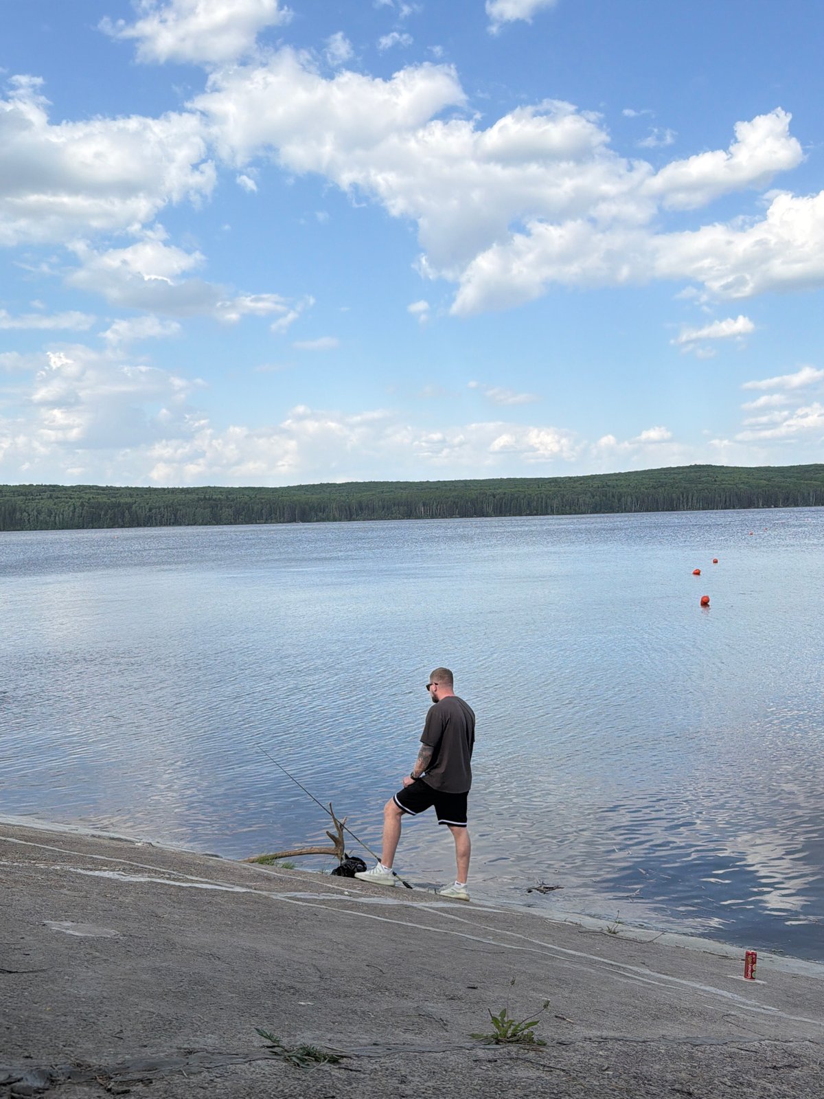 Leisure activities documented along Chaikovsky riverbank during morning hours