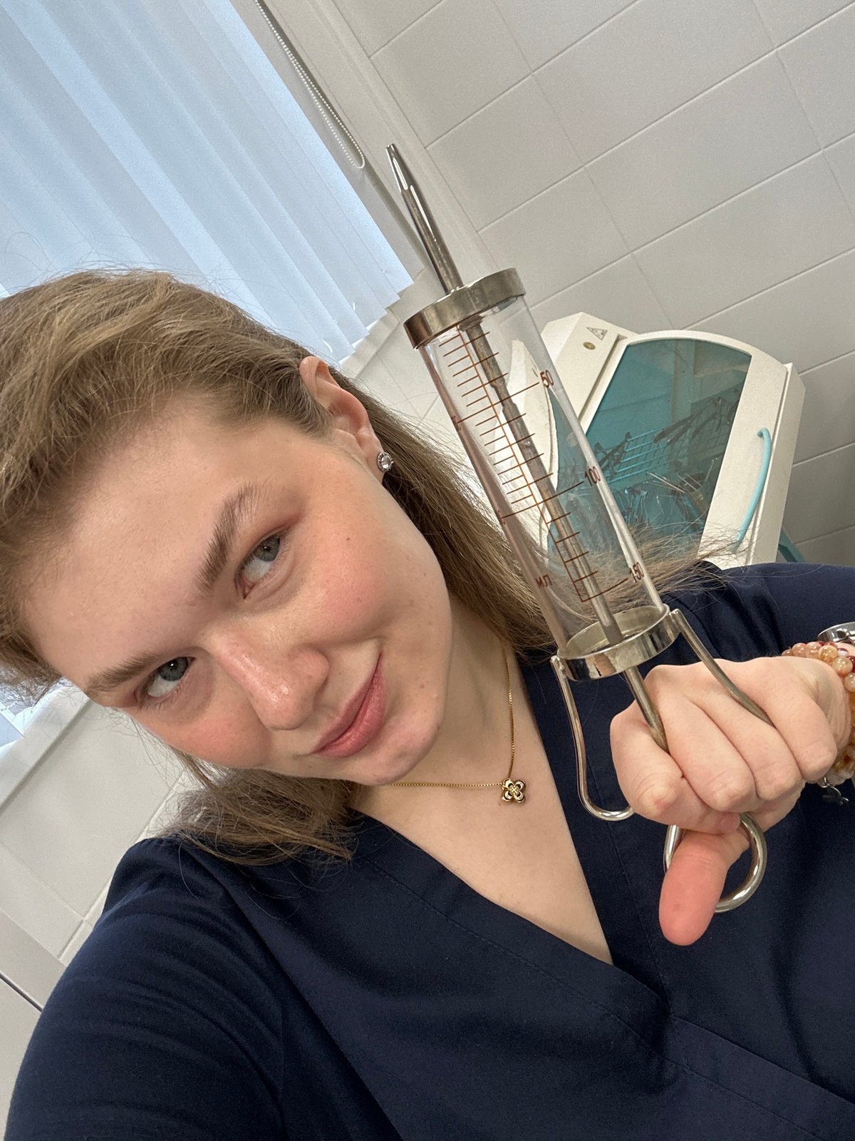 Healthcare worker documents medical equipment during shift in Kazan