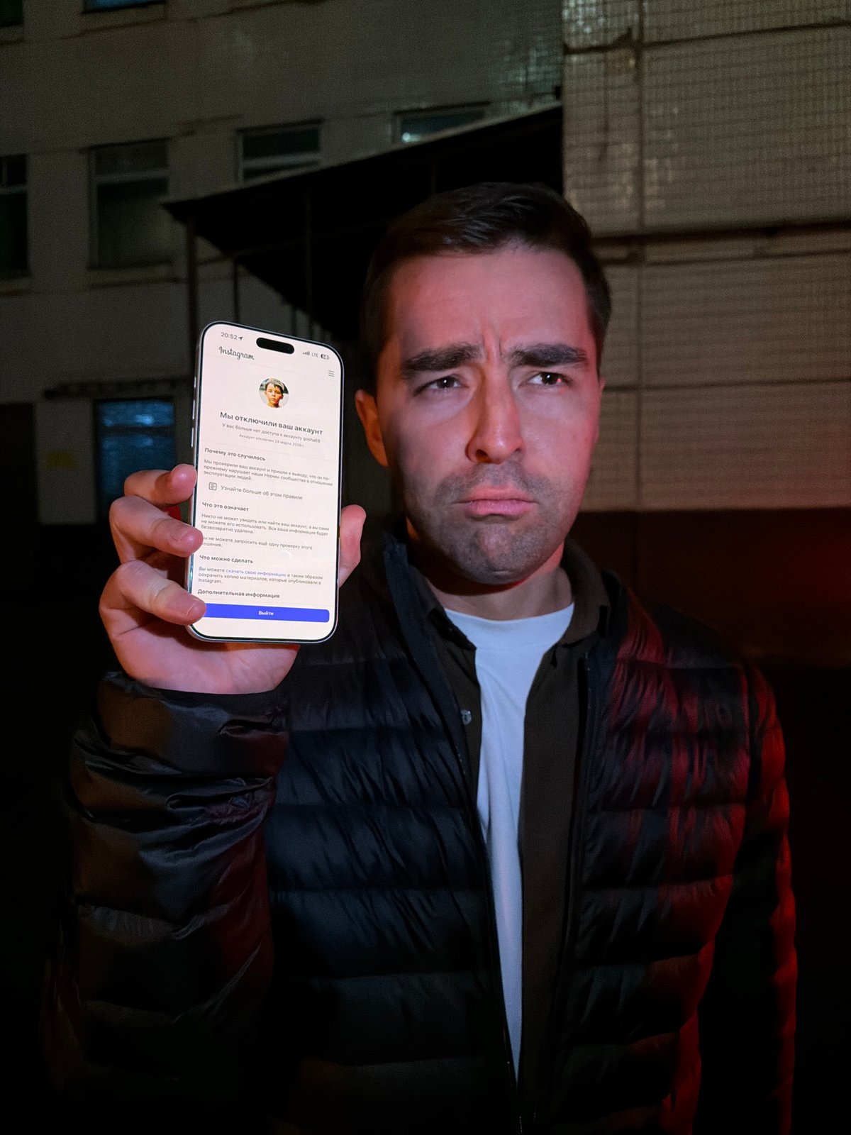 Three people pose for selfie in Moscow