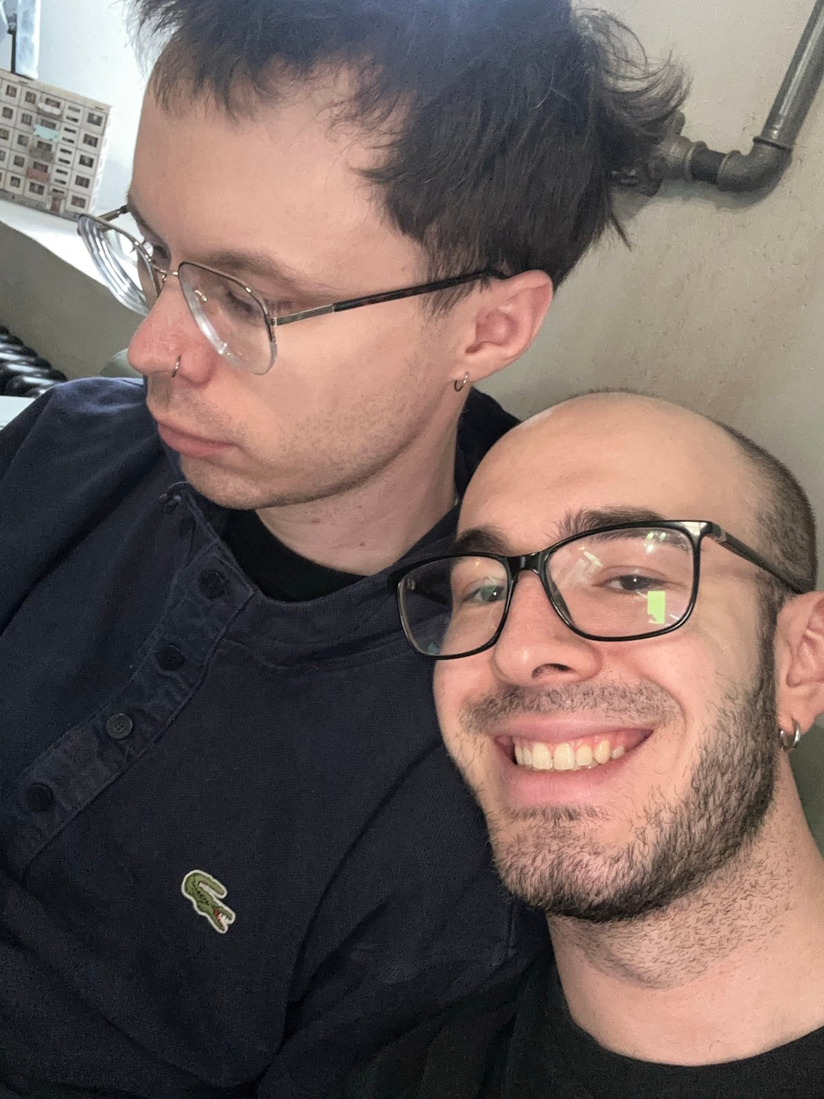 Two men photographed at Dyshoria retail space in Moscow
